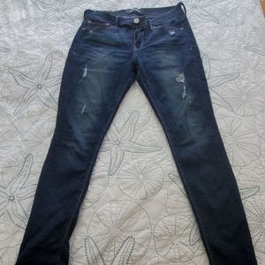 Express distressed skinny jeans
